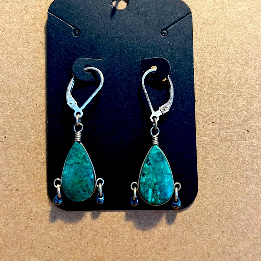 Green jasper maybe? Set in sterling with hematite drops